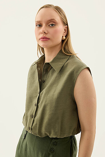 Beli Lastikli Önü Düğmeli Sıfır Kol Bluz - 9