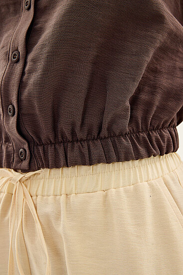 Beli Lastikli Önü Düğmeli Sıfır Kol Bluz - 21