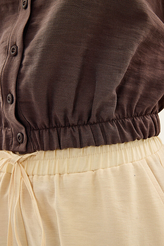 Beli Lastikli Önü Düğmeli Sıfır Kol Bluz - 21