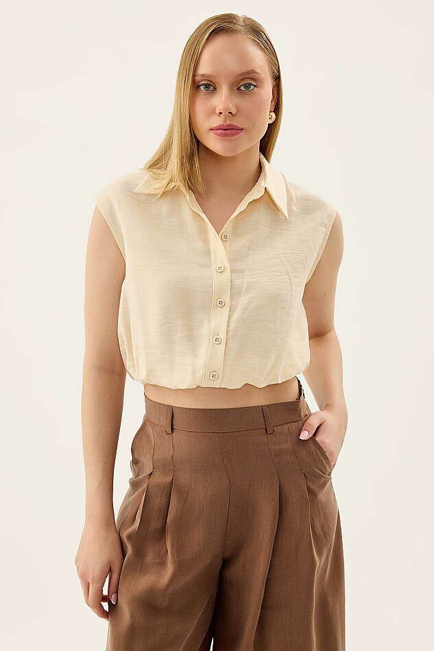 Beli Lastikli Önü Düğmeli Sıfır Kol Bluz - 23