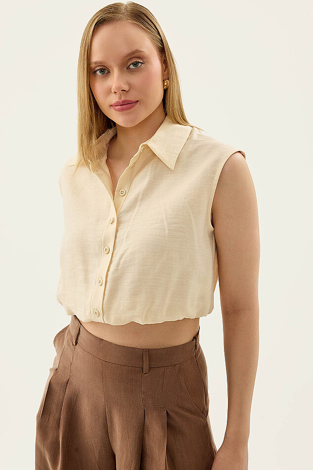 Beli Lastikli Önü Düğmeli Sıfır Kol Bluz - 24