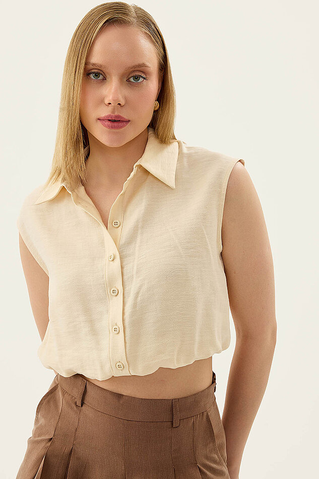 Beli Lastikli Önü Düğmeli Sıfır Kol Bluz - 25