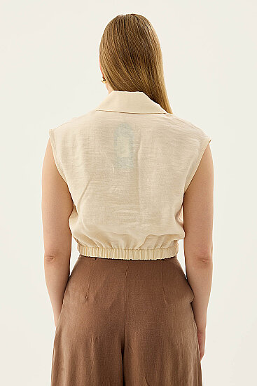 Beli Lastikli Önü Düğmeli Sıfır Kol Bluz - 27