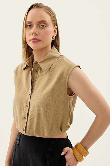 Beli Lastikli Önü Düğmeli Sıfır Kol Bluz - 31