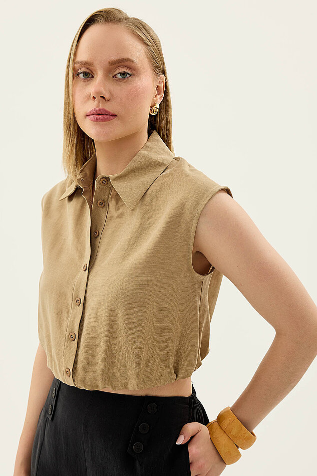 Beli Lastikli Önü Düğmeli Sıfır Kol Bluz - 31